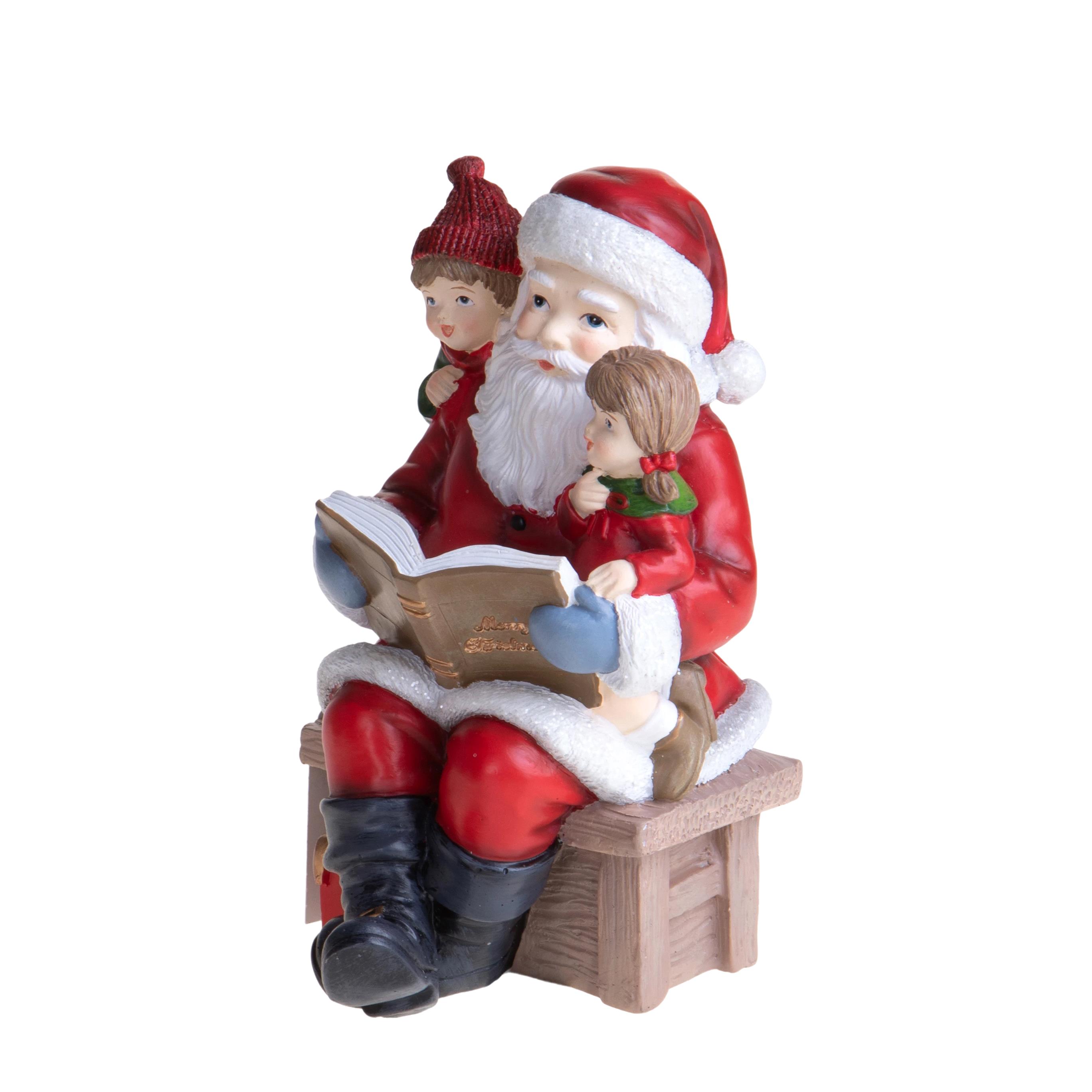 BABBO NATALE 18 CM CHE LEGGE C/BAMBINO