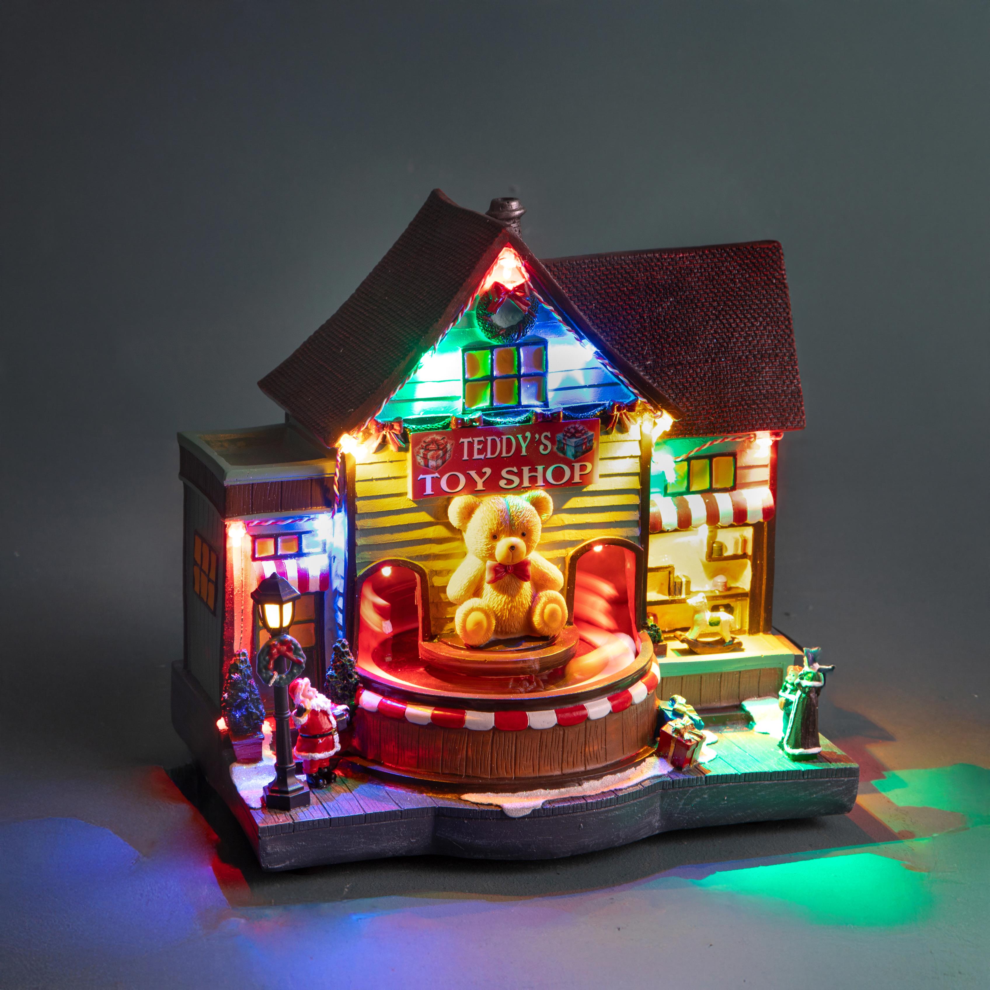 NEGOZIO 25 CM C/ORSETTO MUS+LED+MOV.