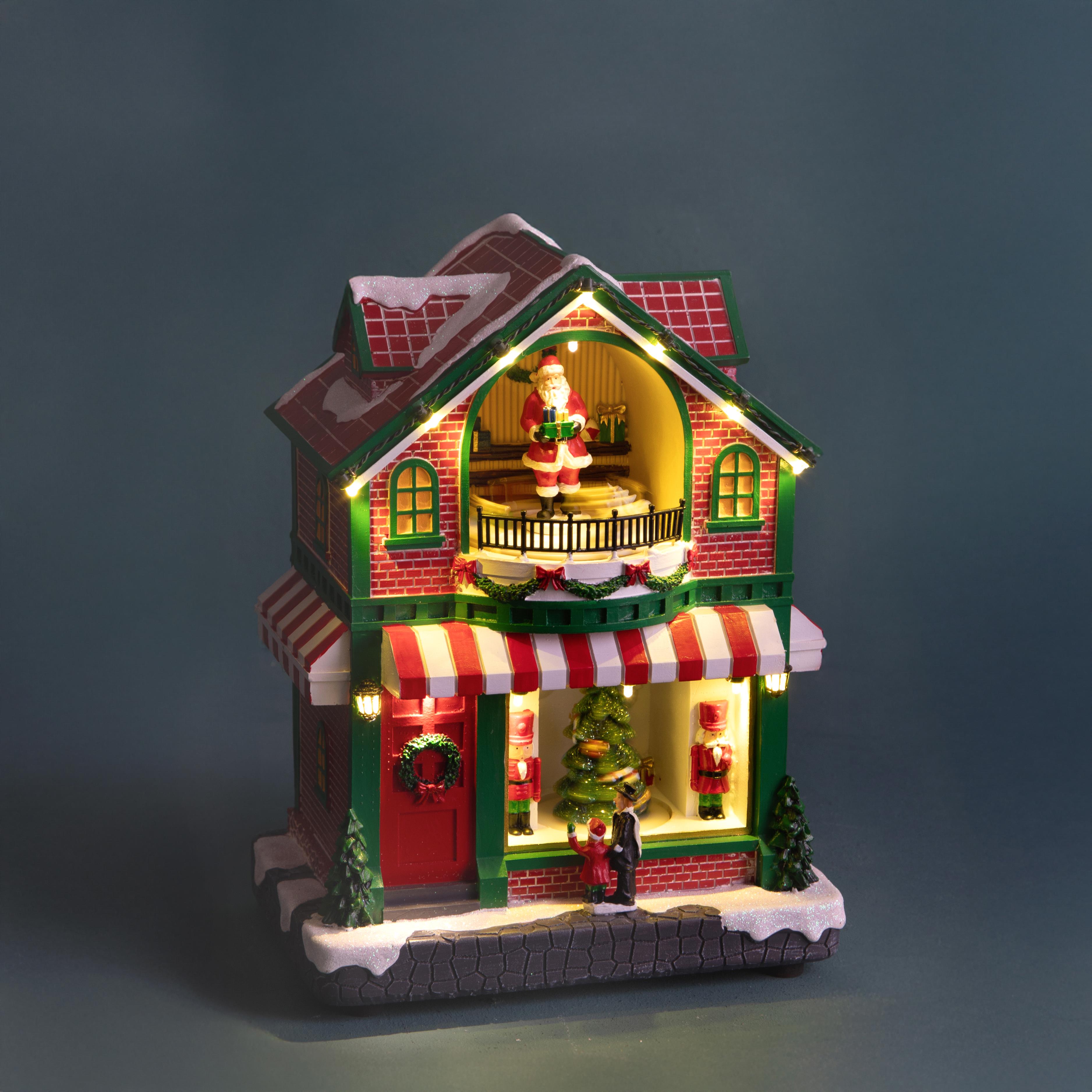 CASA 27 CM C/ALBERO MUS+LED+MOV.